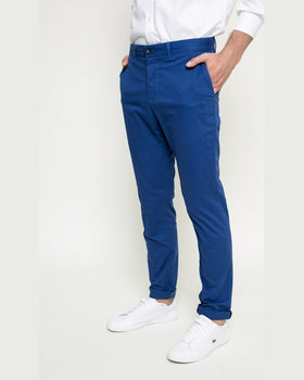 Pantaloni Lacoste albastru deschis